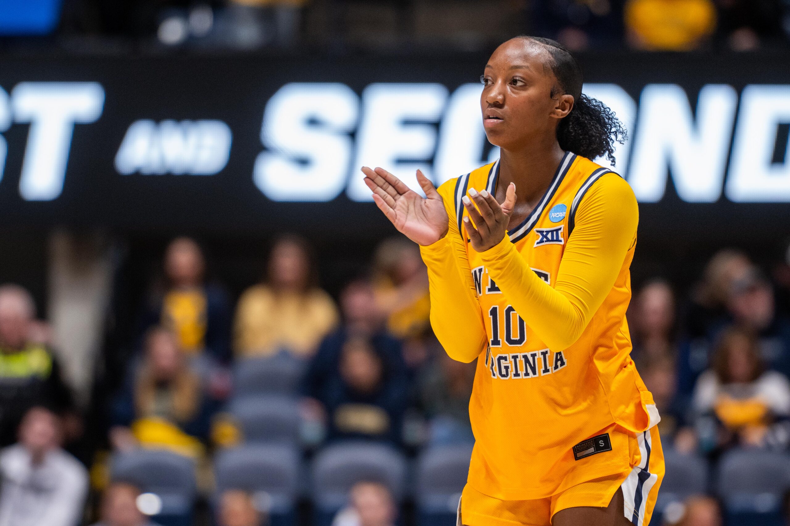 Mark Kellogg navigating how to coach WVU women's basketball without star Jordan Harrison
